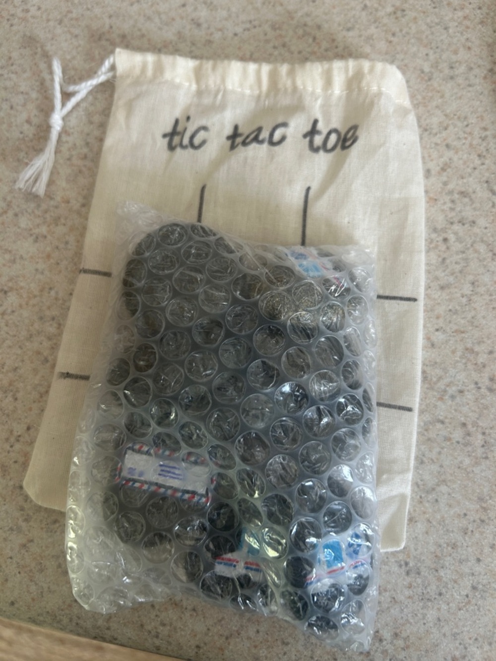 Mail Carrier Tic Tac Toe Drawstring Pouch with Game Pieces - Cream and Black